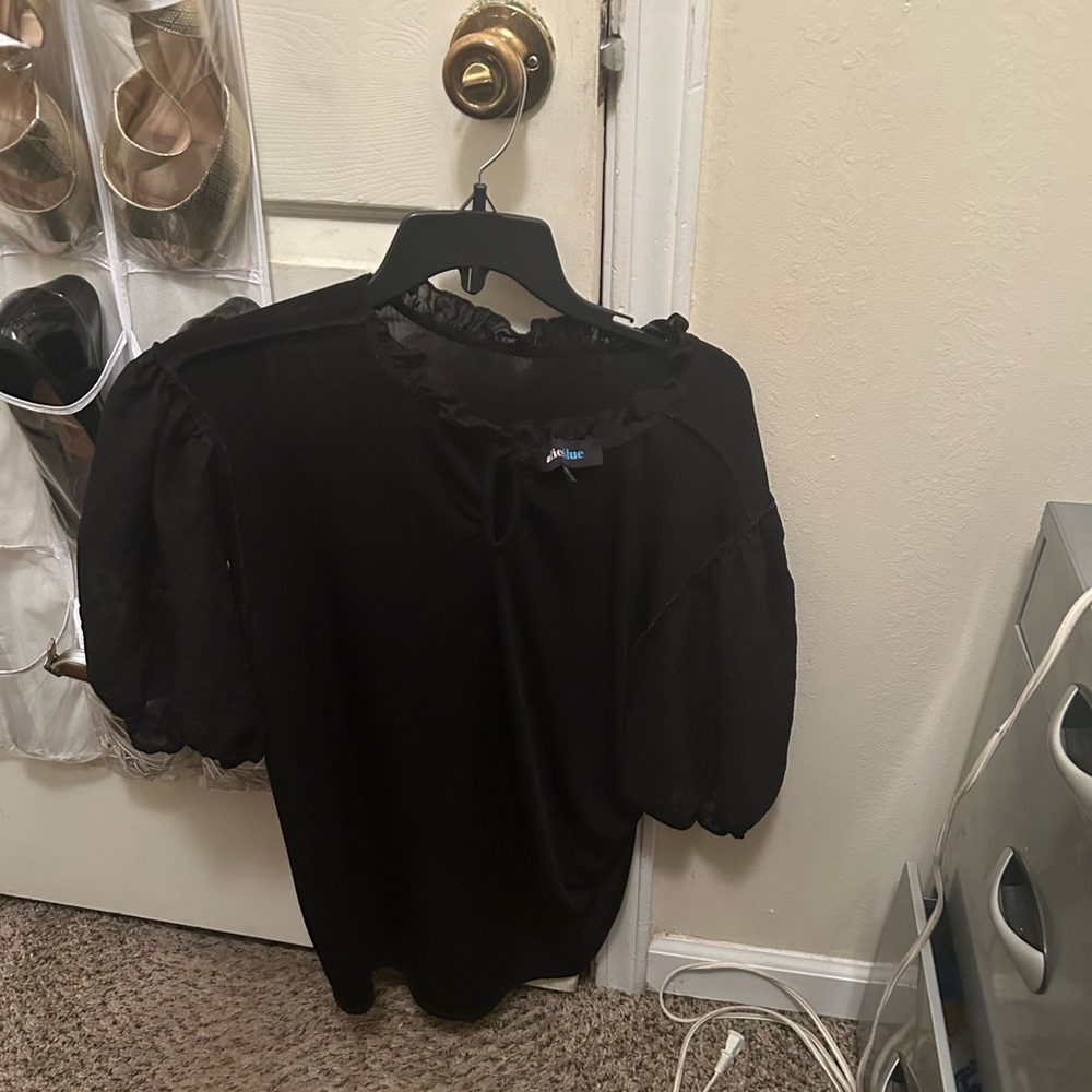 Nice black dressy blouse can be worn up or down causal or business